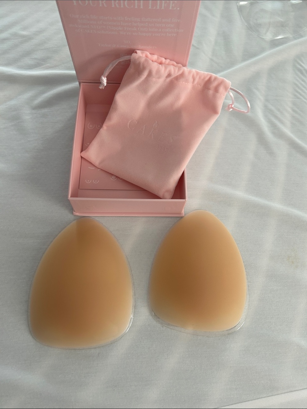 New, never worn Silicone Adhesive Bra Inserts with Pink Drawstring Pouch — Nude